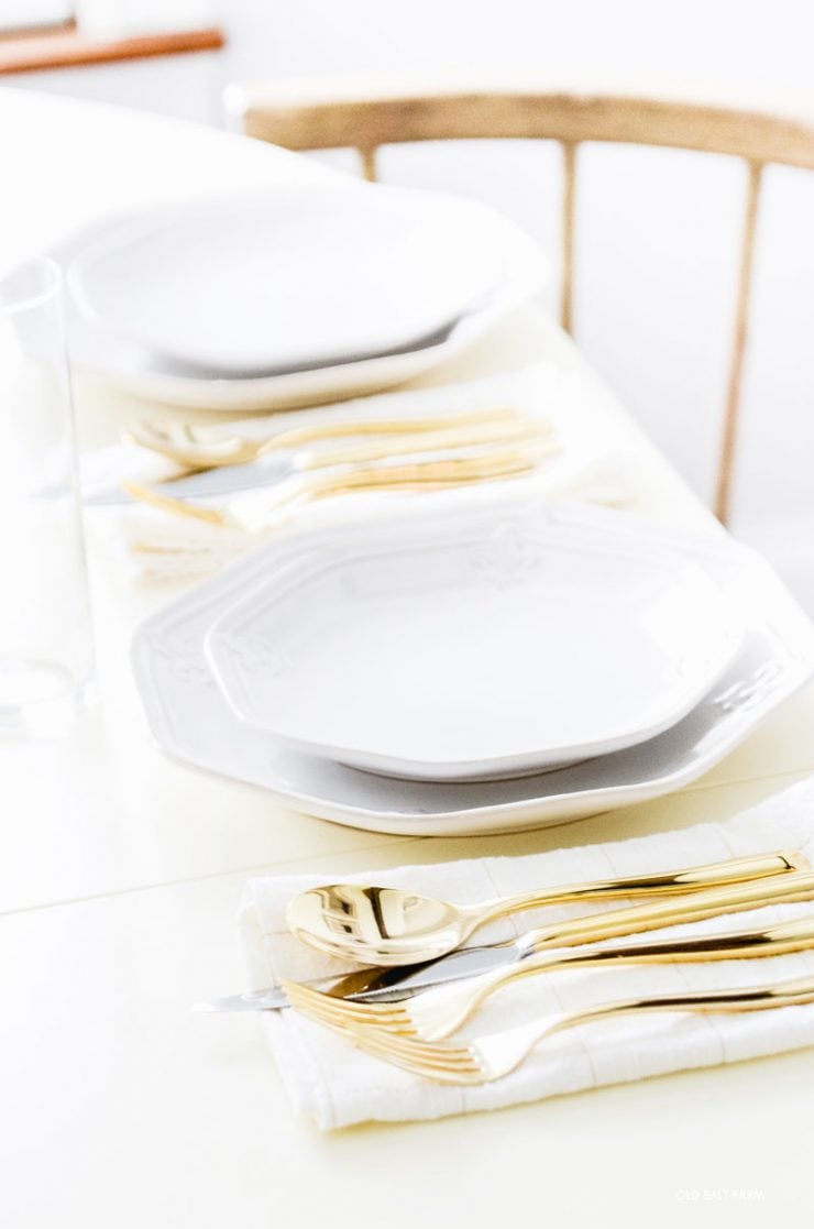 gold-flatware-white-dishes